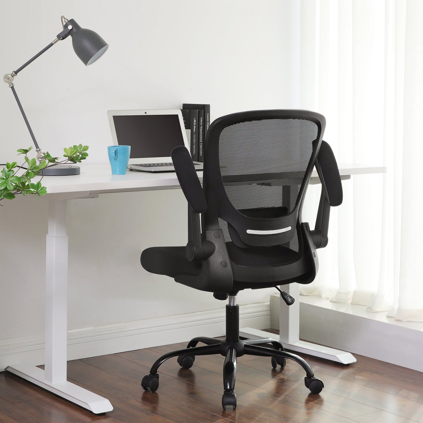 Office chair with foldable armrests